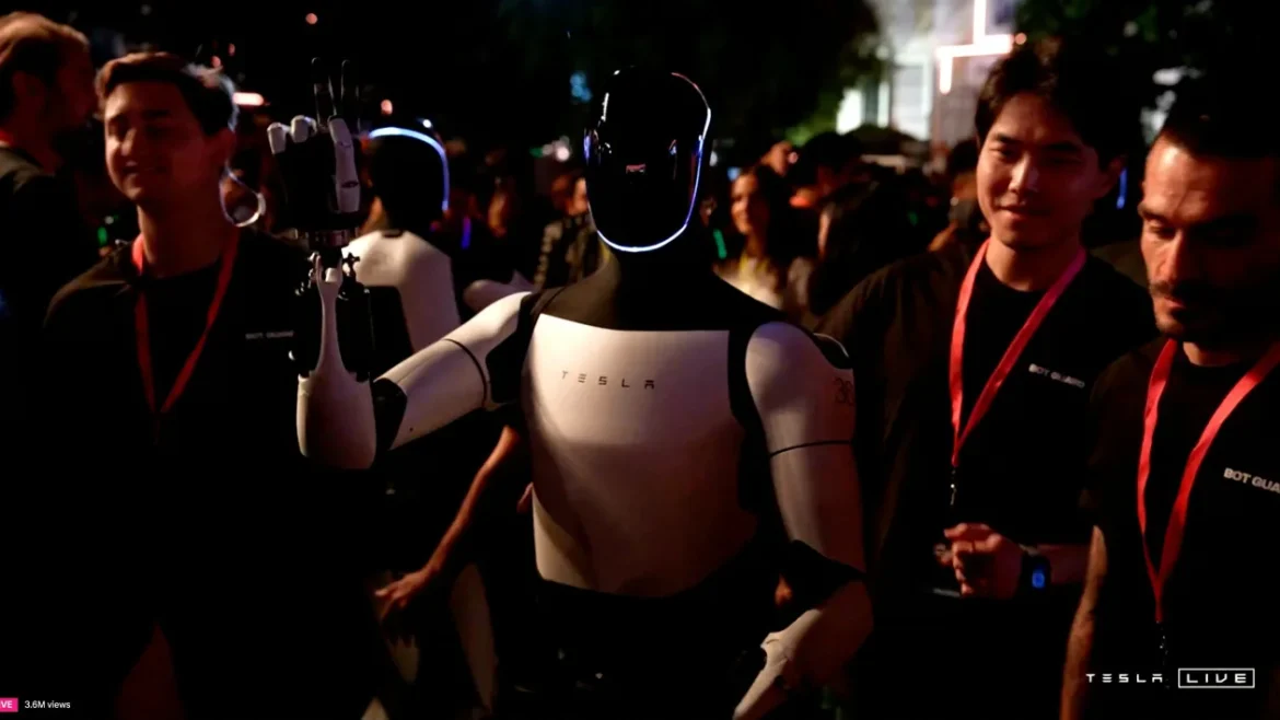 Tesla’s Optimus robot gestures at an unveiling event in Los Angeles, Oct. 10, 2024.